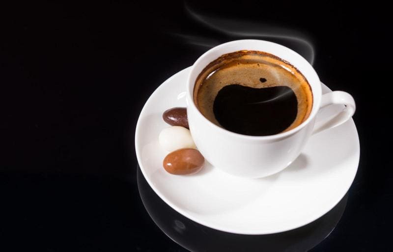 Indulge in the perfect combination of rich chocolate and freshly roasted coffee beans